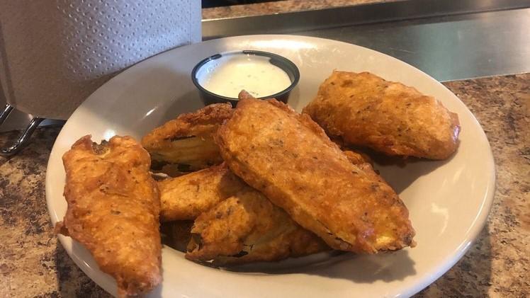 Fried Pickles · Cajun battered slices of dill pickles.
Served with house-made ranch dressing