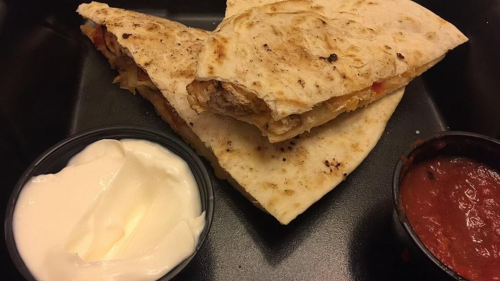 Chicken  Quesadilla · Grilled flour tortilla filled with Cheddar Jack cheese, and pico. Served with a side of salsa and sour cream.