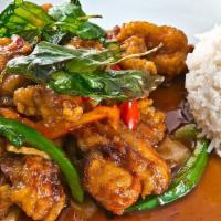 Spicy Chicken · Breaded chicken stir fried with onion and bell peppers in spacial sweet and spicy sauce. Top...