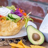 Veggie Taco Salad · Vegetarian. Flour shell filled with lettuce, rice, whole beans, green onions, sour cream, gu...