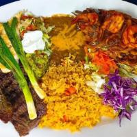 El Nayarita · The perfect dish for two people. One whole tilapia, 4 shrimp, charbroiled steak, and chicken...