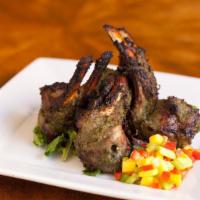 Laziz Paslian (Grilled Lamb Chops) · Gluten-free. Marinated in five greens and grilled in 