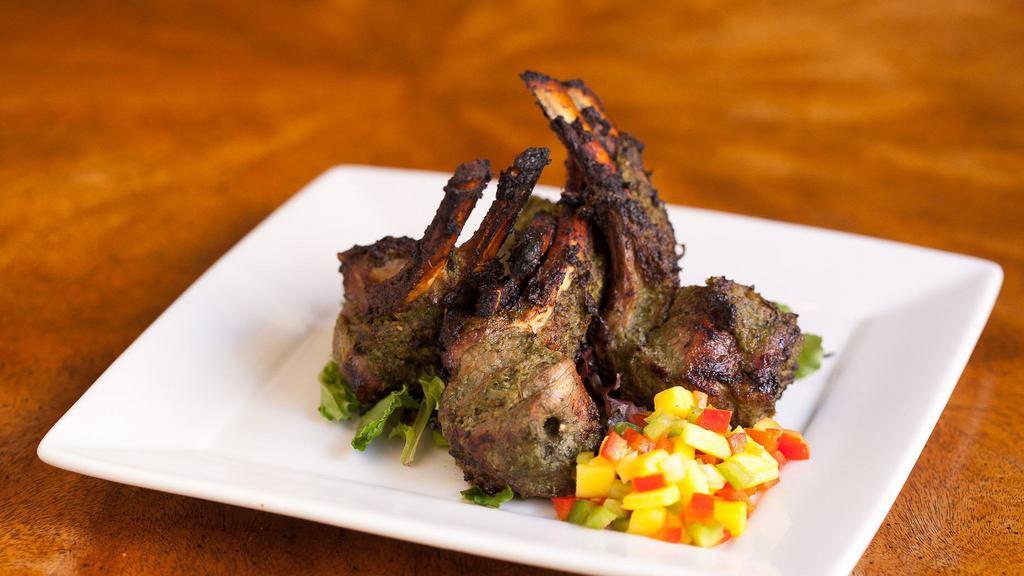 Laziz Paslian (Grilled Lamb Chops) · Gluten-free. Marinated in five greens and grilled in 