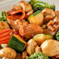 Garlic Chicken · White chicken with freshly wok'd garlic, zucchini, carrots, broccoli, mushrooms, water chest...