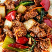 Spicy Korean Beef · A blazing sauce with seared peppers, onions, and dry chili peppers.