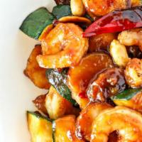 Kung Pao Shrimp · A blazing sauce with seared chilies, peanuts, water chestnuts, zucchini and dry chili pepper...