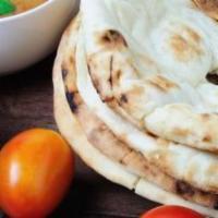 Plain Naan · Traditional Indian leavened bread.