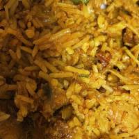 Mother India Dum Biryani · A classic dum biryani-a spice mix of meat and rice, traditionally cooked over an open fire i...