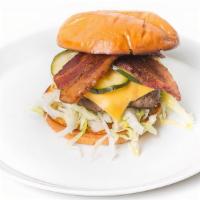 The Roxy · house made beef burger with american cheese,
pickles, sauce and lettuce.