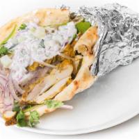 Ruby Murray · chicken tikka curry wrap with cooling cucumber &
cilantro yogurt