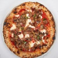 Tutta Bella · tomato sauce, italian sausage, mushroom, onion, fresh mozzarella, basil