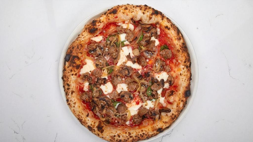 Tutta Bella · tomato sauce, italian sausage, mushroom, onion, fresh mozzarella, basil