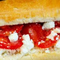 Feta & Tomato · Meatless. A generous portion of premium feta cheese, vine ripe tomato slices, olive oil, and...