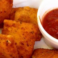 Fried Raviolis (6) · Breaded raviolis stuffed with mozzarella, Monterey Jack, Romano and Asiago cheeses and fried...