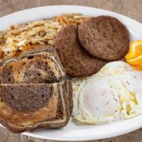 The Par* · Two eggs any style with two double-thick bacon strips or two sausage patties or ham slice wi...