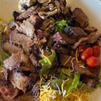 Pit Boss Bbq Chop Salad · Mixed greens, bacon, tomatoes, mushrooms, and cheddar cheese, tossed with our BBQ ranch dres...