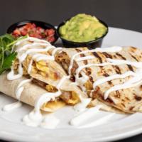 Bld Breakfast Quesadilla · Scrambled eggs, pepper jack cheese, with bacon and sausage on a flour tortilla, topped with ...
