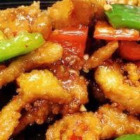 Spicy Honey  Chicken · 🌶️ Lightly breaded white meat chicken stir fried w/ bell peppers in chef's special honey dr...