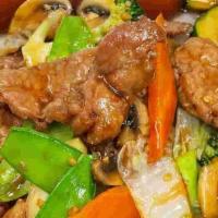Beef W. Mixed Vegetables · Beef w/ green peppers and onions.