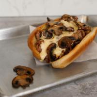 Mushroom Cheesesteak · Savory mushroom cheesesteak with delicious steak, white American cheese, grilled onions, and...