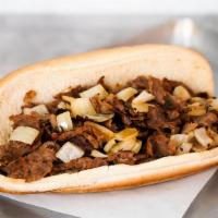 Cheesesteak Sandwich · Delicious cheesesteak sandwich with mouth watering steak, American cheese, and grilled onions.