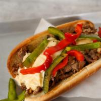 Pepper Cheesesteak · Yummy pepper cheesesteak with delicious steak, white American cheese, grilled onions, and gr...