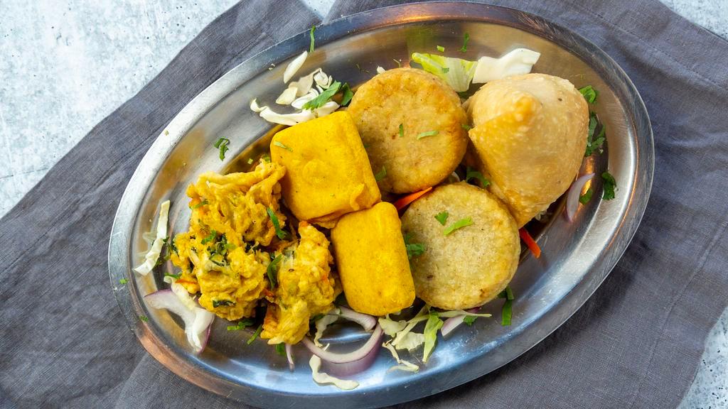 Everest Platter Vegetarian · Mix of aloo tikki, paneer pakoda, vegetable pakoda and vegetable samosa.