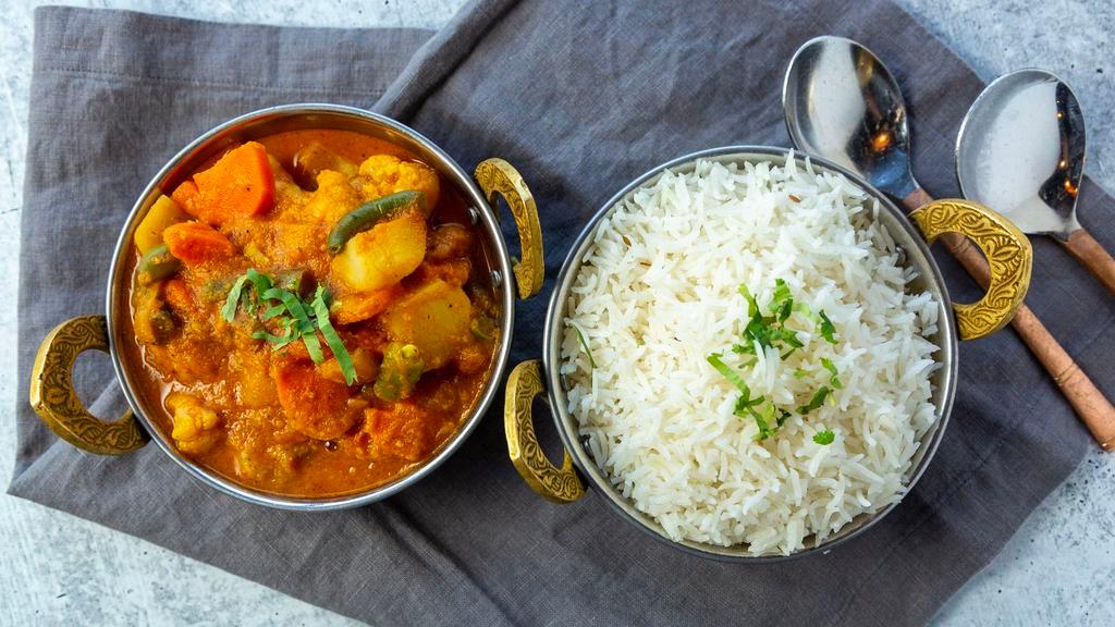 Vegetable Curry · Mixed vegetables cooked in curry spices. Served with side of basmati rice.
