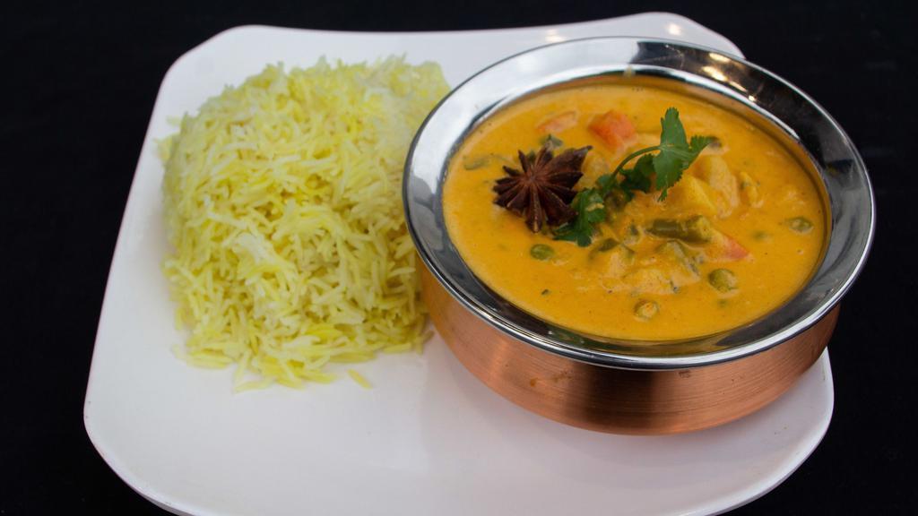 Vegetable Korma · Seasonal vegetables cooked in creamy sauce with almonds and coconut.