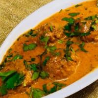 Malai Kofta · Spicy vegetable balls cooked in a delicately blended cream sauce.