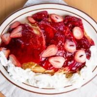 Fresh Strawberry Pancakes (4) · Slices of fresh strawberries baked into the pancakes. Topped with warm homemade strawberry c...