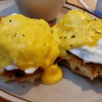 Eggs Benedict Florentine · Two poached eggs atop English muffin halves with fresh sautéed spinach, mushrooms, and tomat...