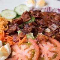 Blt Salad · Fresh bacon slices, shredded cheddar cheese and boiled egg halves served over fresh greens. ...