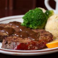 Downhome Dixie Meatloaf · We found this tasty beauty at a small diner in Kentucky. We start with one of our homemade b...