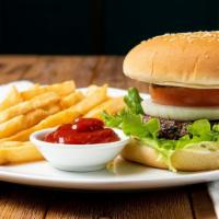 Kafta Burger · Grilled ground lamb kafta patty, onion, tomato, lettuce, pickles and mayonnaise served with ...