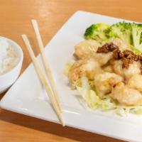 Walnut Shirmp · Deep fried breaded shrimp with creamy white sauce topped with honey glazed walnut.