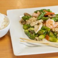 Asparagus With Chicken & Shrimp · Crisp but tender asparagus pieces stir fried with white meat chicken and shrimp in white win...