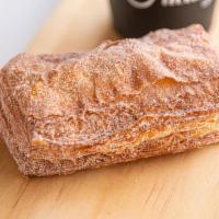 Cinnamon Crobar · Flaky. Croissant and donut hybrid. Cinnamon and sugar covered.