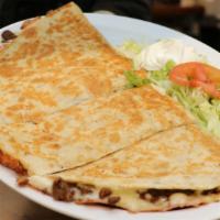 Quesadilla · Flour tortilla grilled with Monterrey Jack cheese with choke of meat and side of lettuce, to...