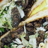 Torta · Made with telera bread, grilled with mayo, served with choice of meat, onion, cilantro, lett...