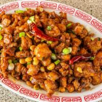 Kung Pao Chicken · Hot & Spicy. Tender Diced Chicken with Peanuts, Chili Peppers in Our Kung Pao Sauce.