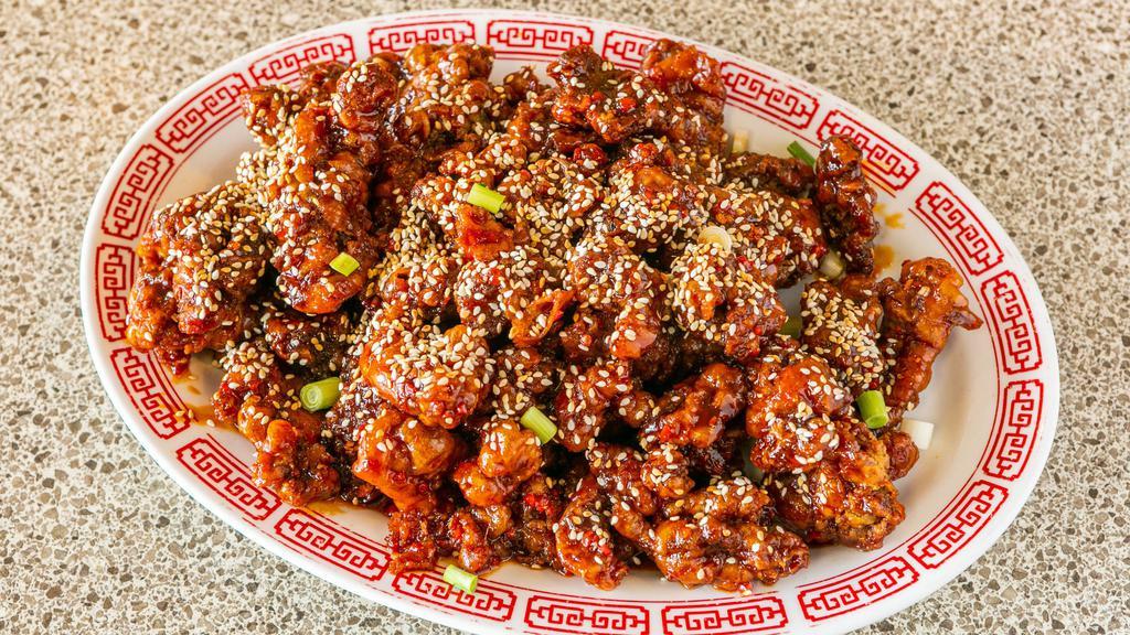Sesame Beef · Sliced Beef Fried Crispy and Glazed with Special Sauce and Sesame Seeds.