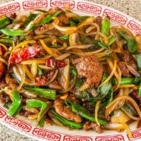 Mongolian Beef · Hot & Spicy. Sliced Beef Sautéed with Green Onion and Served with Crispy Rice Noodles.