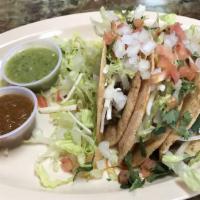 Hard Shell Tacos With Rice And Beans · 2 hard shell tacos with rice and beans