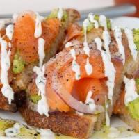 Salmon Avocado Toast · Noble Country Bread / Olive Oil and Lime Mashed Avocado / Smoked Salmon / Chive Creme Fraich...