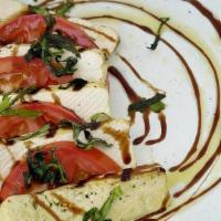 Tofu Caprese · Herb Grilled Organic Tofu / Heirloom Tomatoes / Balsamic Reduction / Olive Oil / Mint