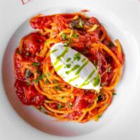 Bucatini Pomodoro · House-Made Hollow Spaghetti-Like Pasta, San Marzano Tomato, Basil & House Ricotta.