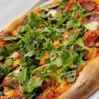 Yoshi  Pizza · Prosciutto, Roasted Asparagus, Fontina, Arugula, Roasted Garlic Olive Oil