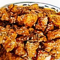 Sesame Chicken
 · Spicy. Tender pieces chicken marinated in sesame sauce and quickly fried and sauteed to pres...