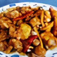 Chicken With Orange Flavor
 · Spicy. Deep fried chicken served to with orange zest and flecks of garlic, and dried hot pep...